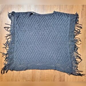 Knit fringe poncho